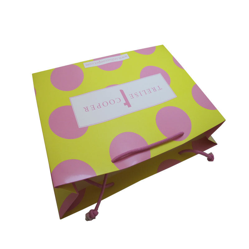 Customized paper bag with nylon rope